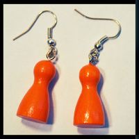 Image de boucles d'oreilles pions orange